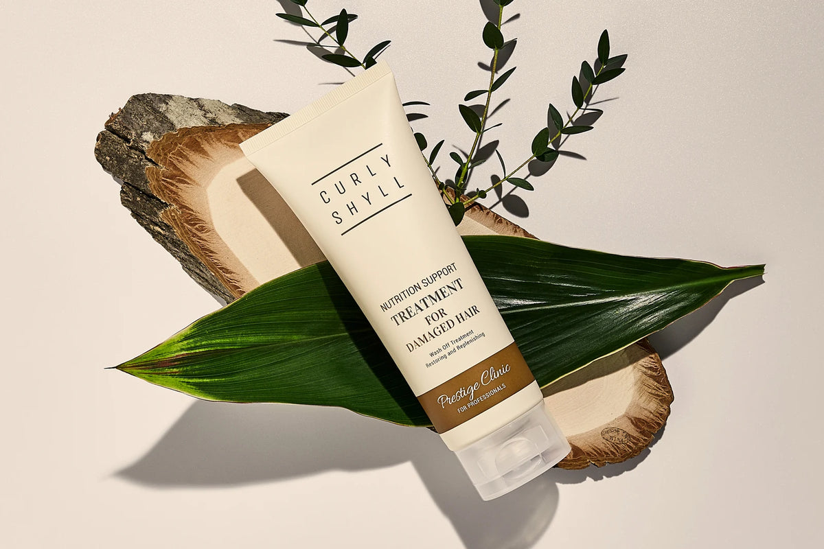 Tube Nutrition Support Treatment sur une feuille et un morceau de bois