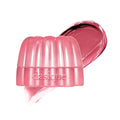 Pot de maquillage Chewing Glow de Dasique avec un design coloré et lumineux, idéal pour un look éclatant.