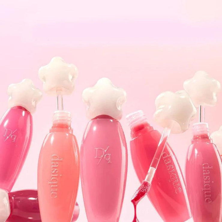 Gloss à lèvres Pure Water de Dasique, maquillage, finition brillante, tube transparent avec bouchon argenté.