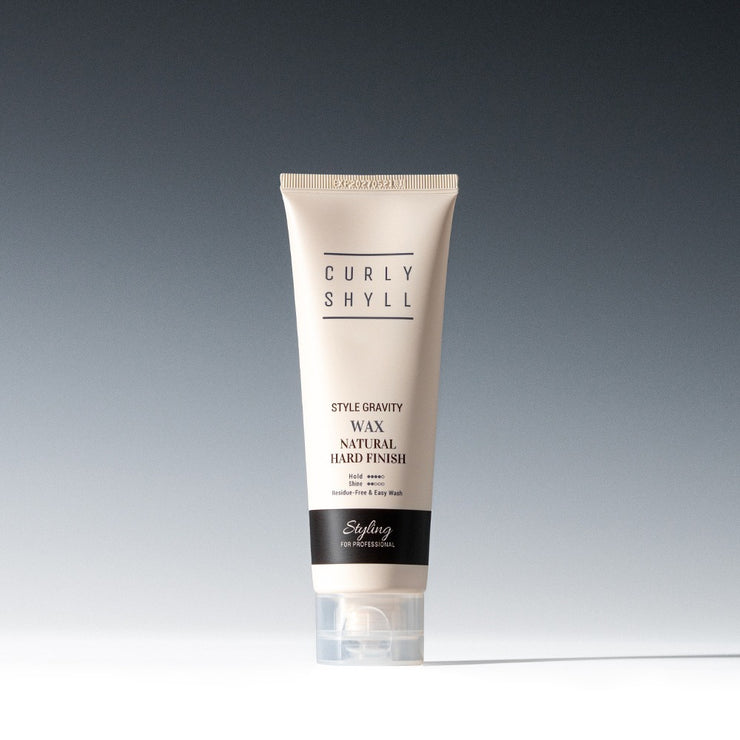 Cire coiffante Curlyshyll zéro gravité pour cheveux, texture légère, fixation naturelle, produit de soin capillaire.