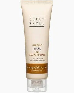 Masque capillaire Curlyshyll pour cheveux bouclés, soin nourrissant pour cheveux frisés, texture crémeuse et hydratante.